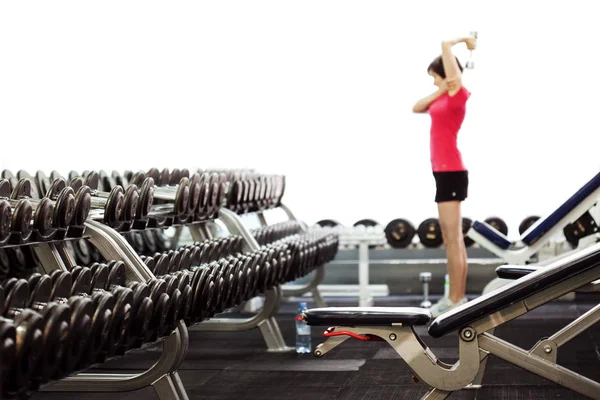 Rows of dumbbells in the gym. Blurred fitness background — Stock Photo, Image