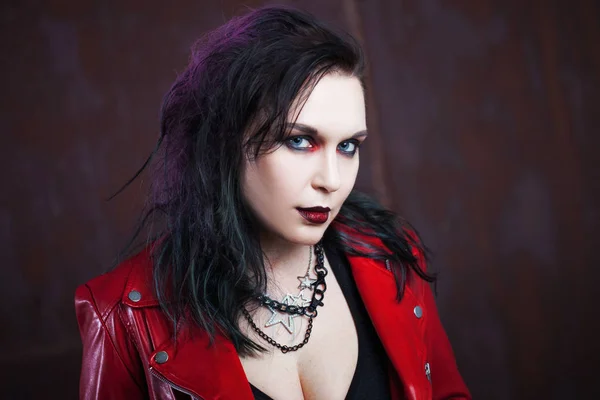 Aggressive punk woman, in red leather jacket — Stock Photo, Image