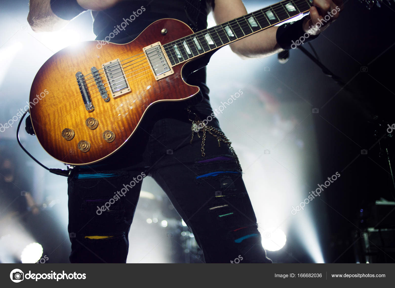 Guitarist on stage, guitar closeup Stock Photo by ©KrisCole 166682036