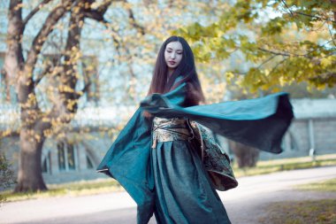Dancing young woman in kimono, Asian costume clipart