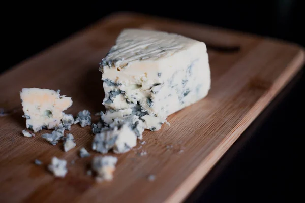 Brie cheese on wooden Board, close-up — Stock Photo, Image