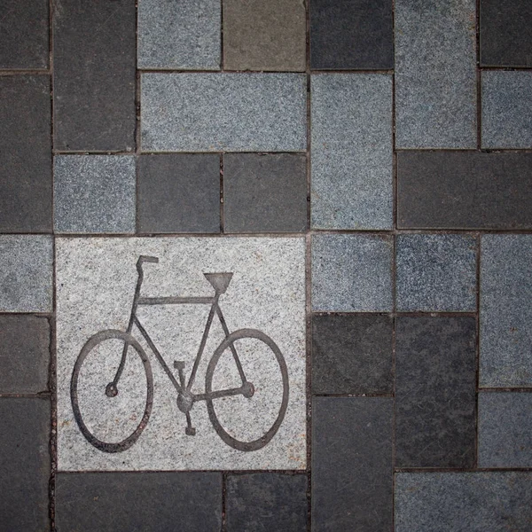 Signo de bicicleta en el pavimento —  Fotos de Stock