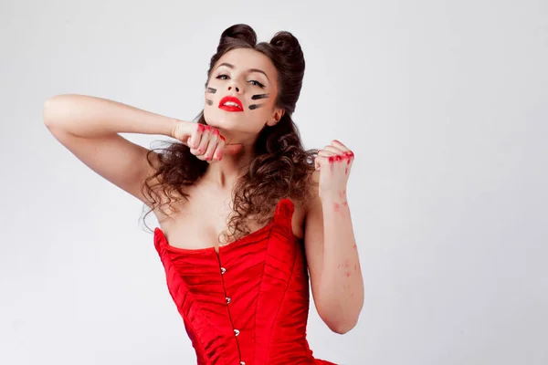 Charming lady in red corset. Sweetie Belle in war paint, girl power — Stock Photo, Image