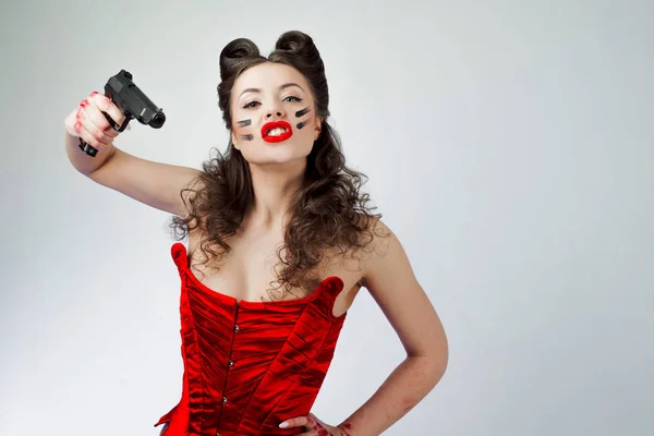 Charming lady in red corset. Sweetie Belle in war paint, girl power — Stock Photo, Image