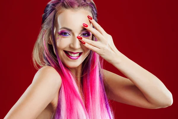 Portrait of a beautiful and crazy girl with pink hair. — Stock Photo, Image