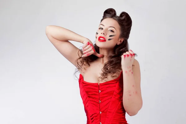 Charming lady in red corset. Sweetie Belle in war paint, girl power — Stock Photo, Image