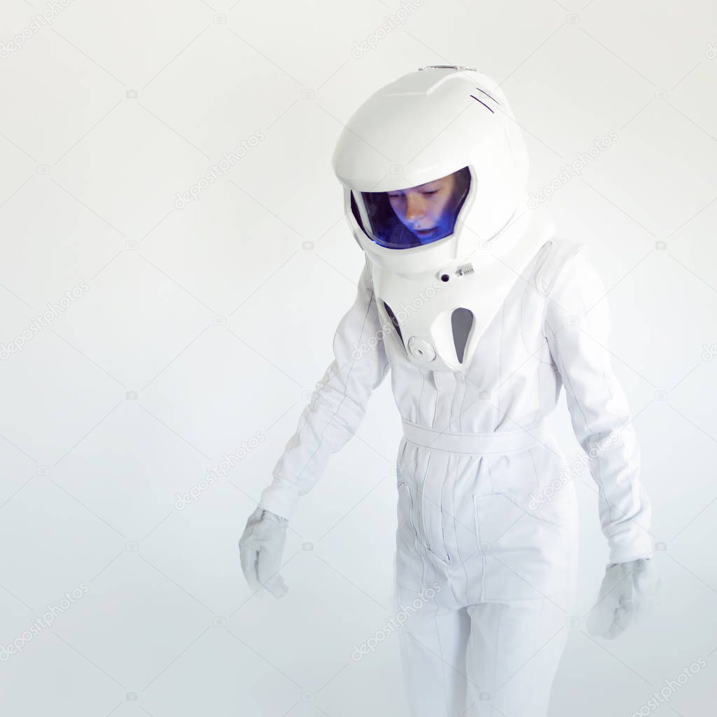 Fantastic space suit walk alone in empty. Astronaut on white background