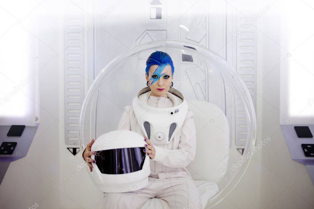 Woman astronaut on a futuristic spaceship.