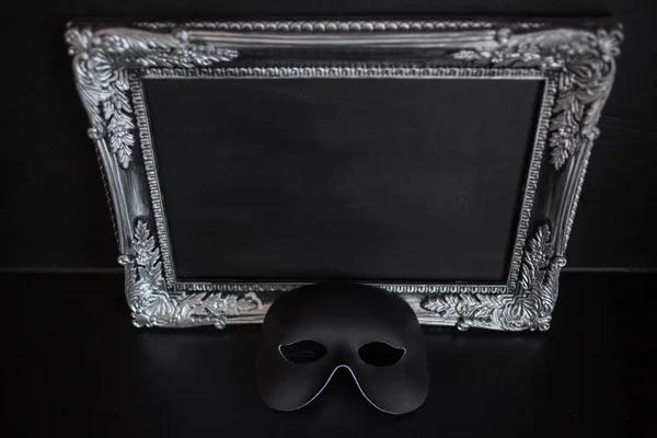 Arnival mask and beautiful silver frame baguette with empty place for your text or design. — Stock Photo, Image