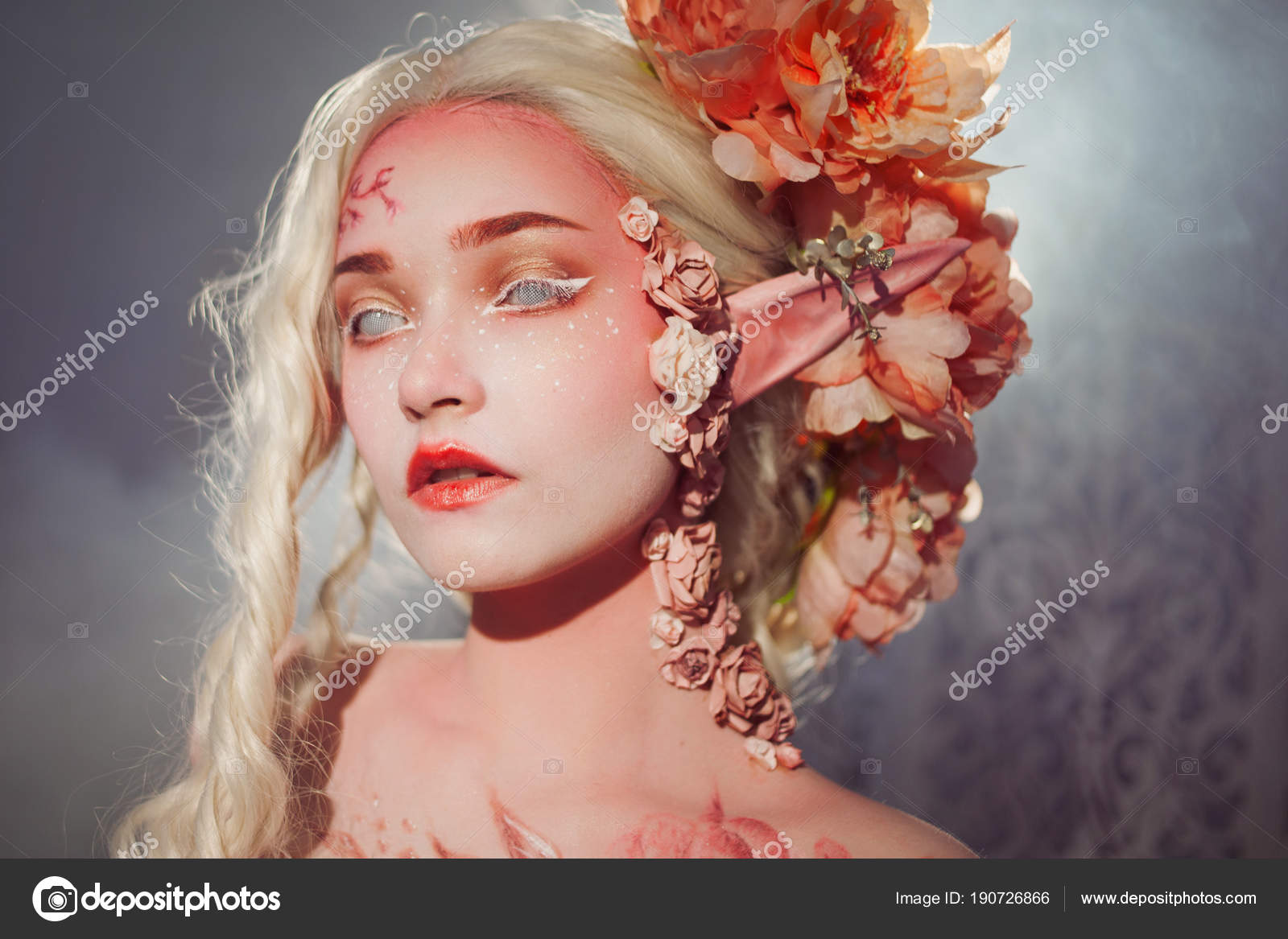 Young beautiful girl elf. Creative make-up and bodyart Stock Photo by  ©KrisCole 190726866