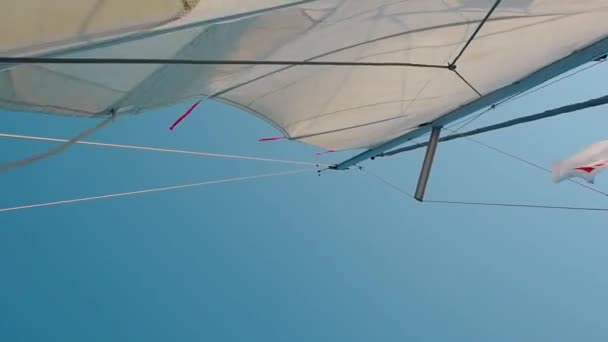 Sail in the wind, fair wind. Sailing yacht view on the mast, — Stock Video