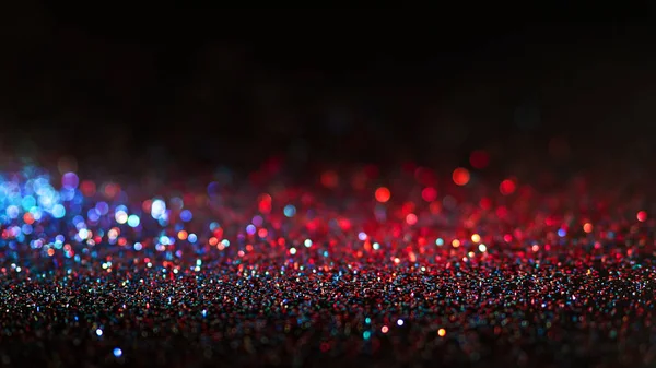 Veelkleurige glanzende glitter in focus en onscherp, abstracte glanzende achtergrond — Stockfoto