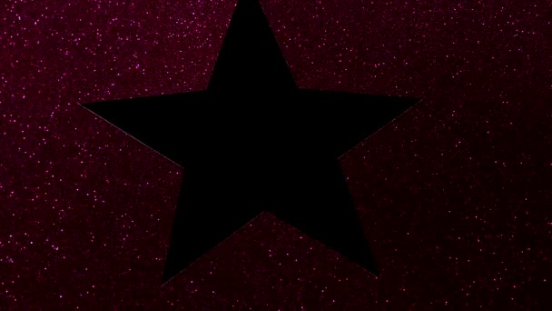Jiskřivý červený povrch s výřezem ve tvaru hvězdy, kopírovací prostor — Stock video