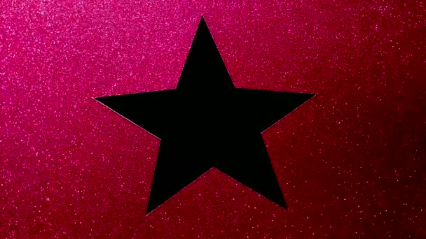 Sparkling red surface with a cutout in the shape of a star, copy space — 图库视频影像