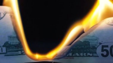Burning 50 ten-dollar bill. Financial crisis