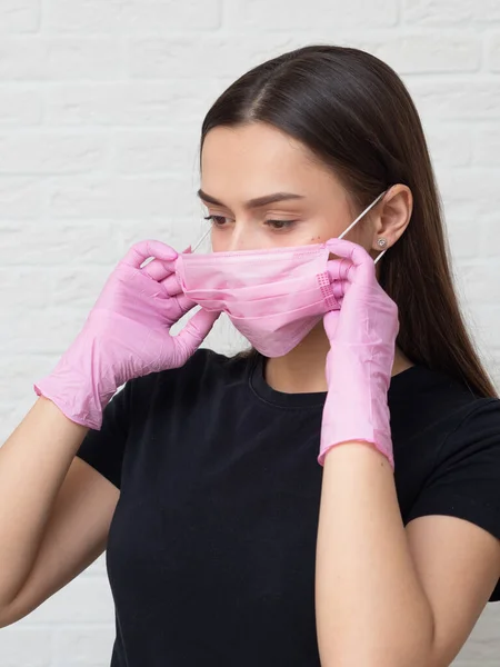 Wear a medical mask and gloves, personal hygiene products in a big city during an outbreak of the virus.