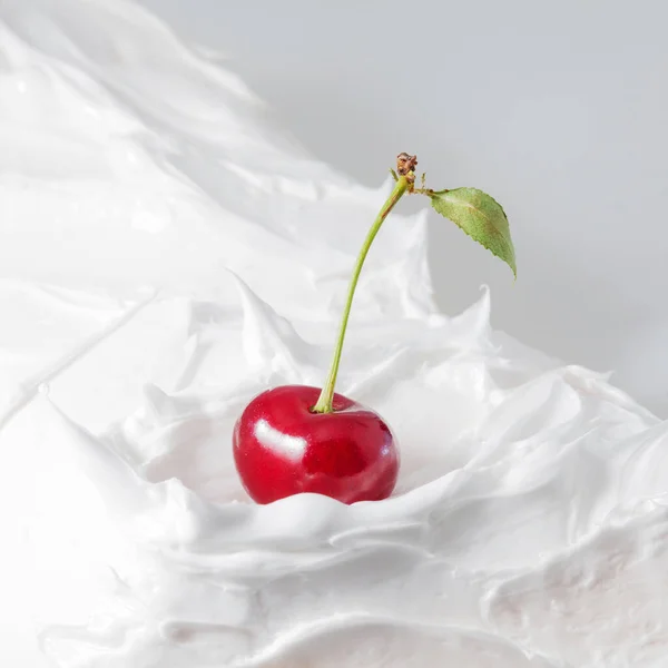 Sweet cherry in yogurt. Close-up milk or cheese dessert with cherries. — Stock Photo, Image