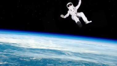 Astronot serbest uçuşta yörüngede, dünya ve uzay gezegeninde