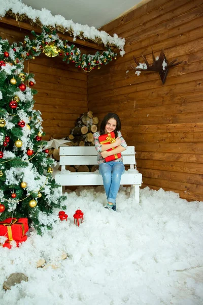 Casual girl with a gift — Stock Photo, Image