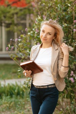 Bir iş kadınının çalışma anı asla bir günlükten ayrılmaz.