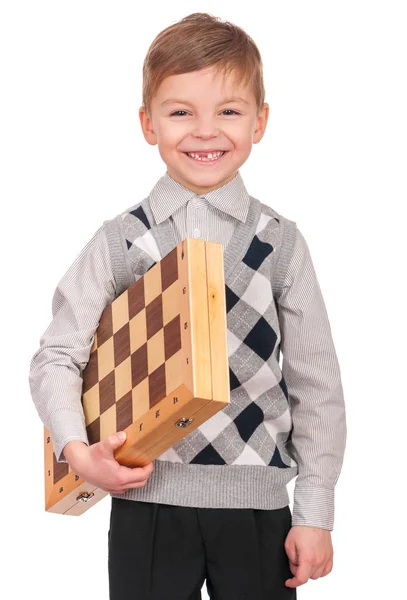 Little boy with chessboard — Stock Photo, Image