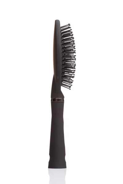 Black hair comb brush — Stock Photo, Image