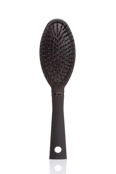 Black hair comb brush — Stock Photo, Image