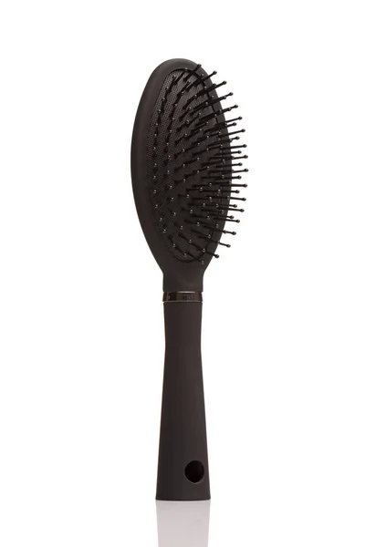 Black hair comb brush — Stock Photo, Image