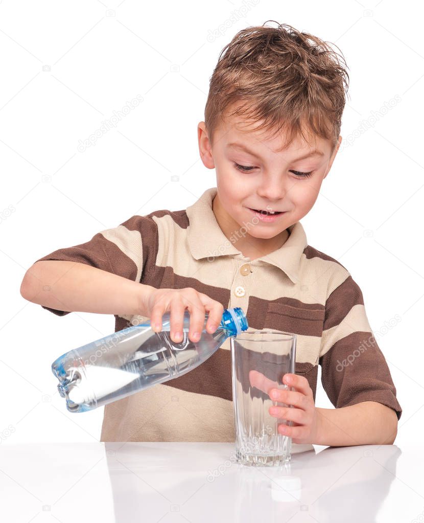 Little boy with plastic bottle of water