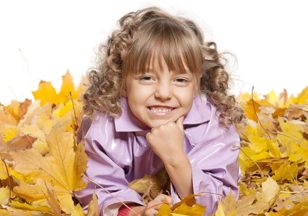Little girl with maple leaves — Stock Photo, Image