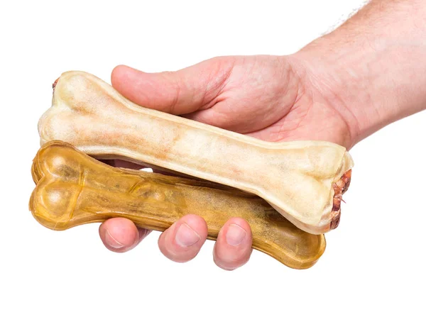 Hand with dog bone — Stock Photo, Image