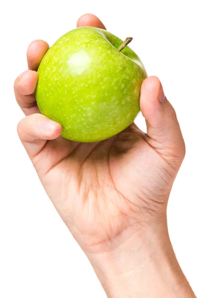 Hand med grönt äpple — Stockfoto