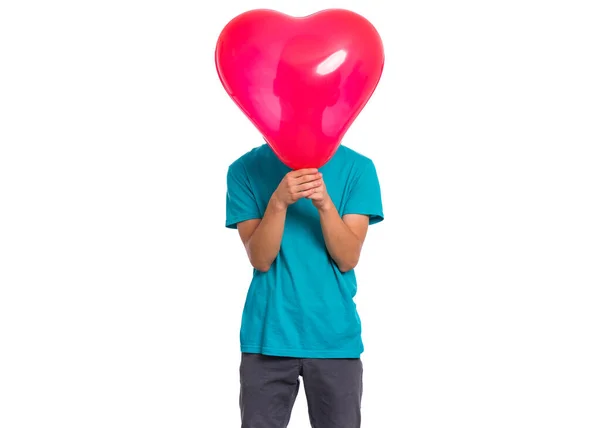 Jongen met hartvormige ballon — Stockfoto