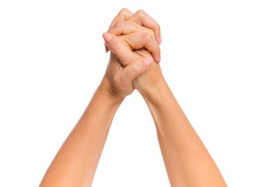 Parmakları yumruk şeklinde katlanmış, beyaz arka planda izole edilmiş bir kadın eli. Fotokopi alanı olan güzel bir kadın eli, kazanan bir jest.