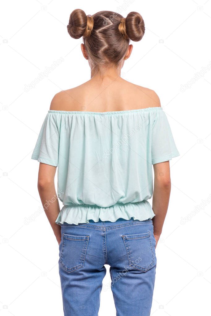 Rear view of teen girl with funny hairstyle, isolated on white background. Portrait of caucasian child putting hands in pockets - back view.