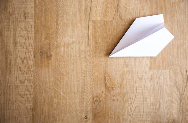 Paper Plane Wooden Floor Background — Stock Photo, Image