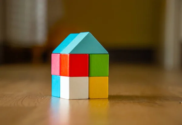 color wooden block form of home icon