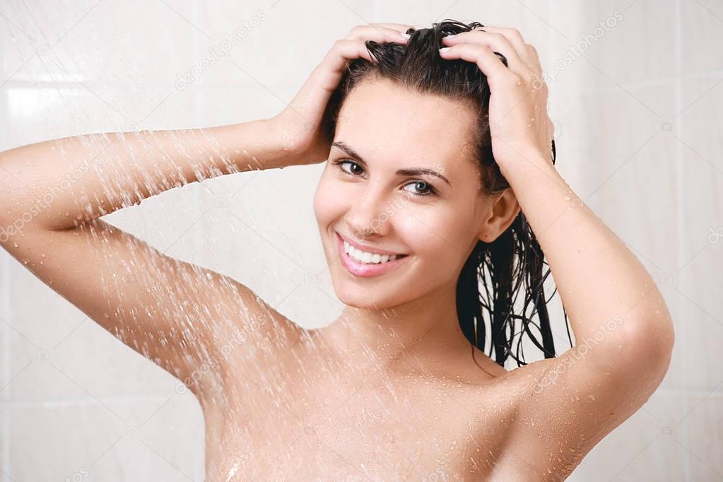 happy young woman in shower