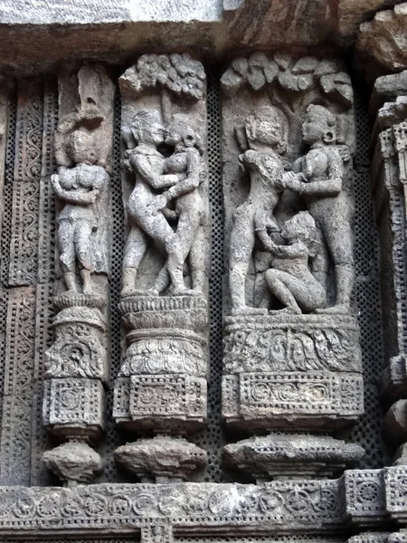 Sculptures of loving couples, mythical figures on outer walls