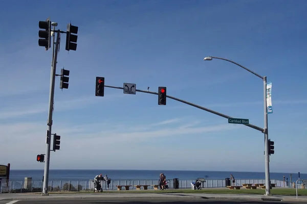 Traffic signals on coastal highway