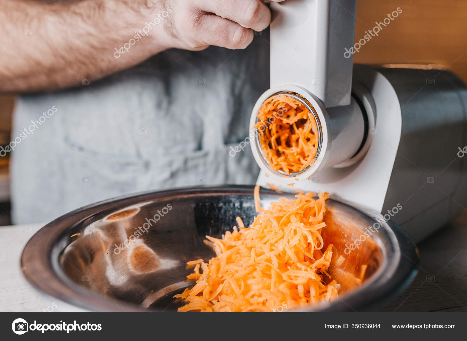 Chopping Carrots Fine Grater Using Electric Food Processor Stock