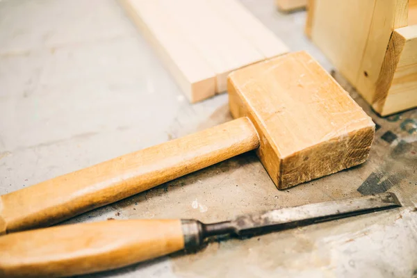 Carpentry workshop - wooden mallet and chisel - carpenter tools