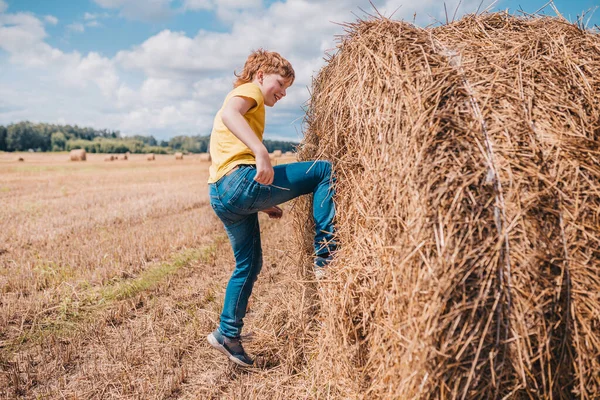 British Red Haired Boy Climbs Haystack Field — Stock Photo, Image