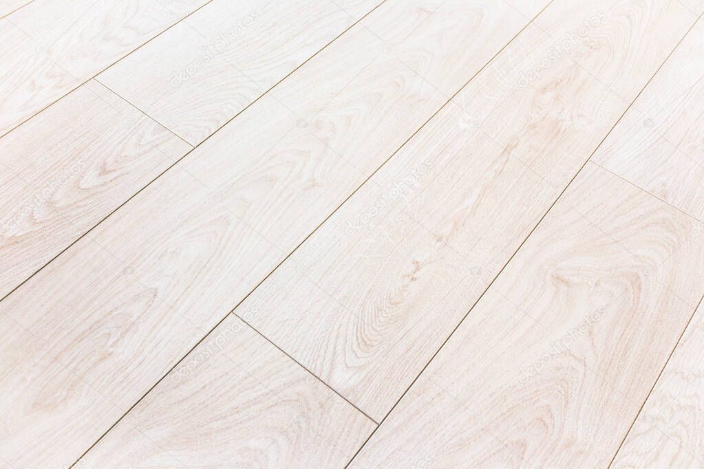 Beautiful durable laminate flooring with imitation oak planks and chamfered joints
