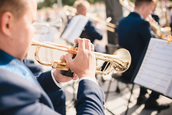 Minsk, Belarus - September 15, 2019: Musical instrument - copper tube with pump action - selective focus