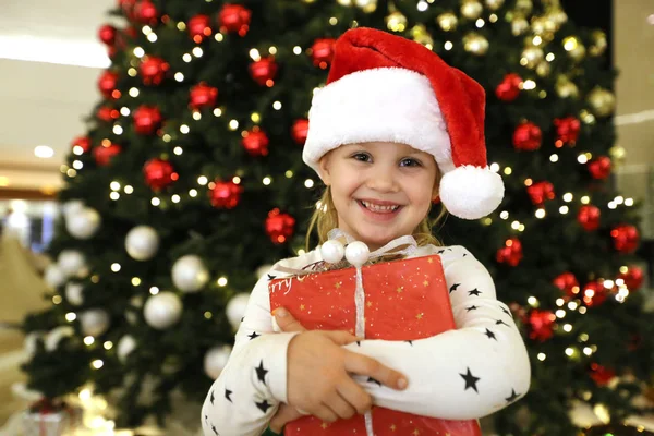 Little  girl near Christmas tree — Stock Photo, Image