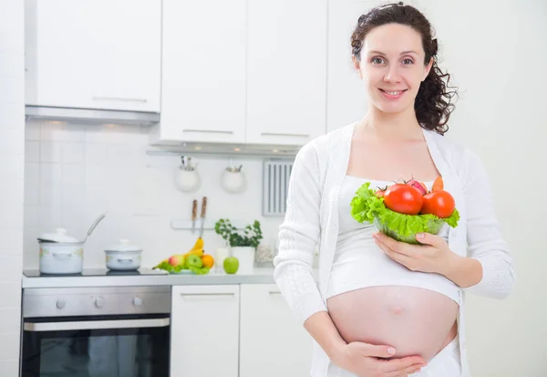Zwangere vrouw met gezonde voeding — Stockfoto