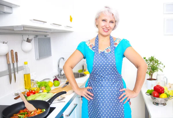 Mature woman on the kitchen — Stock Photo, Image