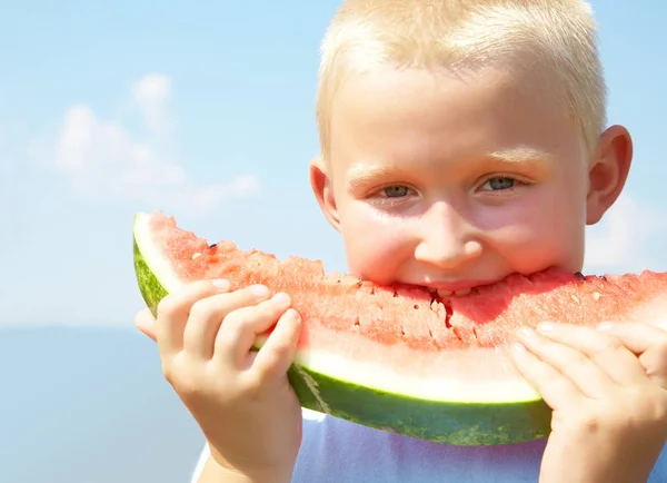 LittleBoy eating watermelon — Stock Photo, Image