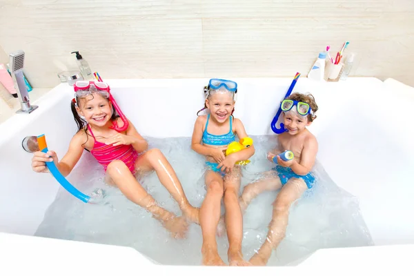 Children play in the bathroom — Stock Photo, Image